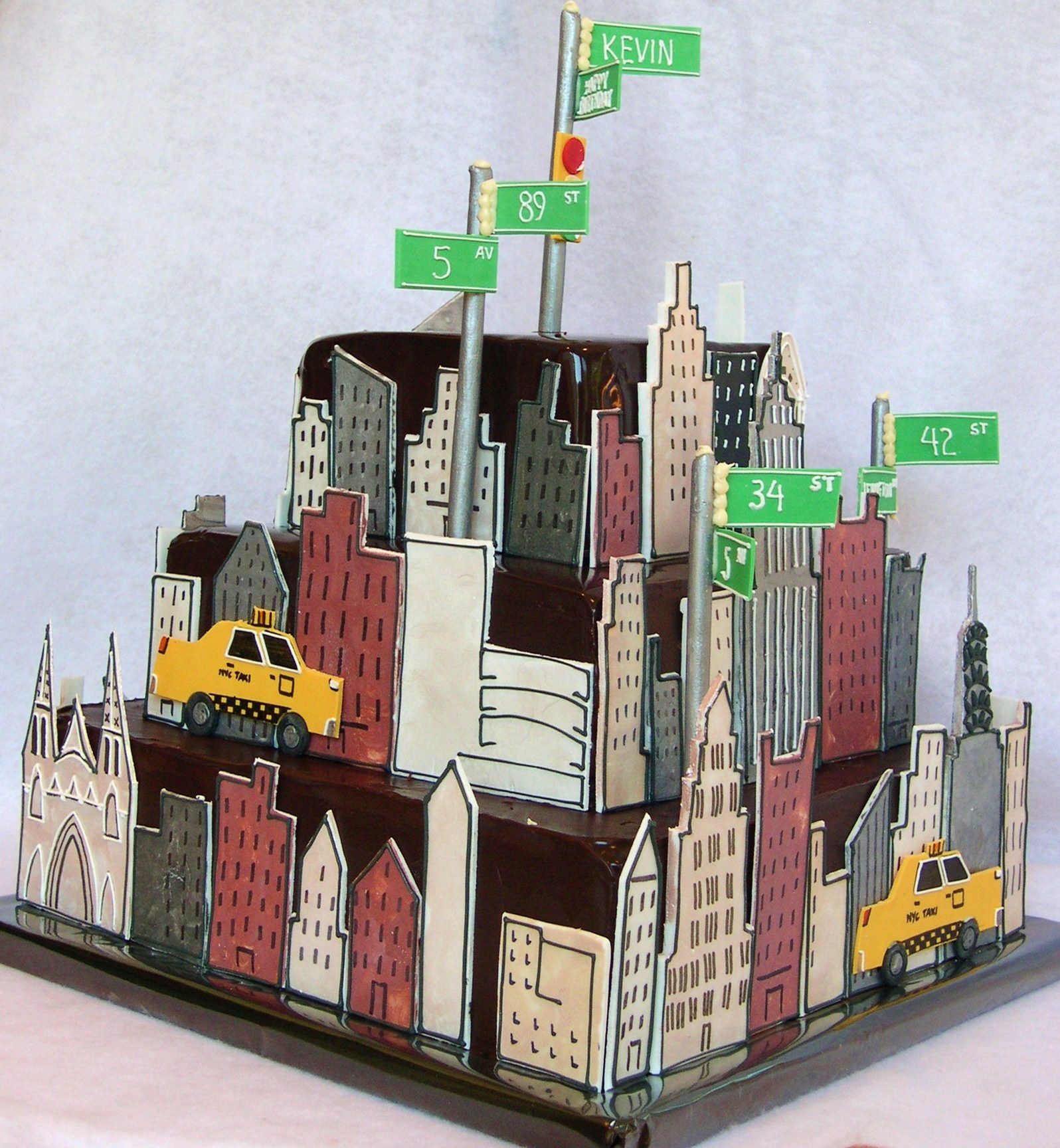 New York City skyline birthday cake with taxis and street signs